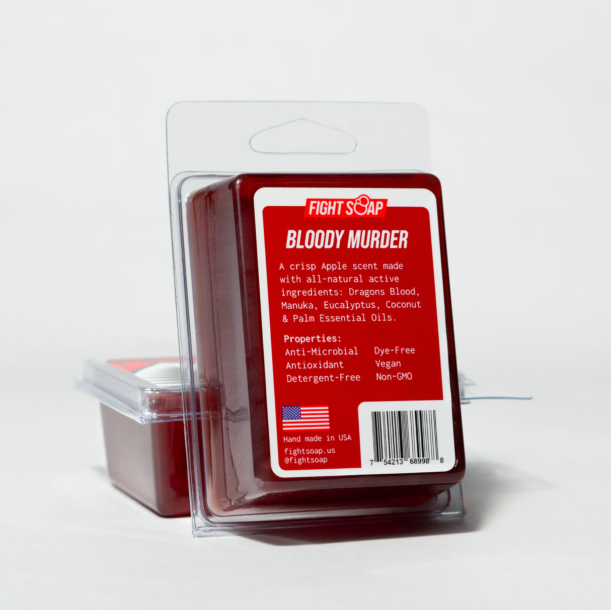 Red and white packaging of Fight Soap "Triple Threat" with ingredients like Dragon's Blood, Manuka, eucalyptus, and coconut oils.