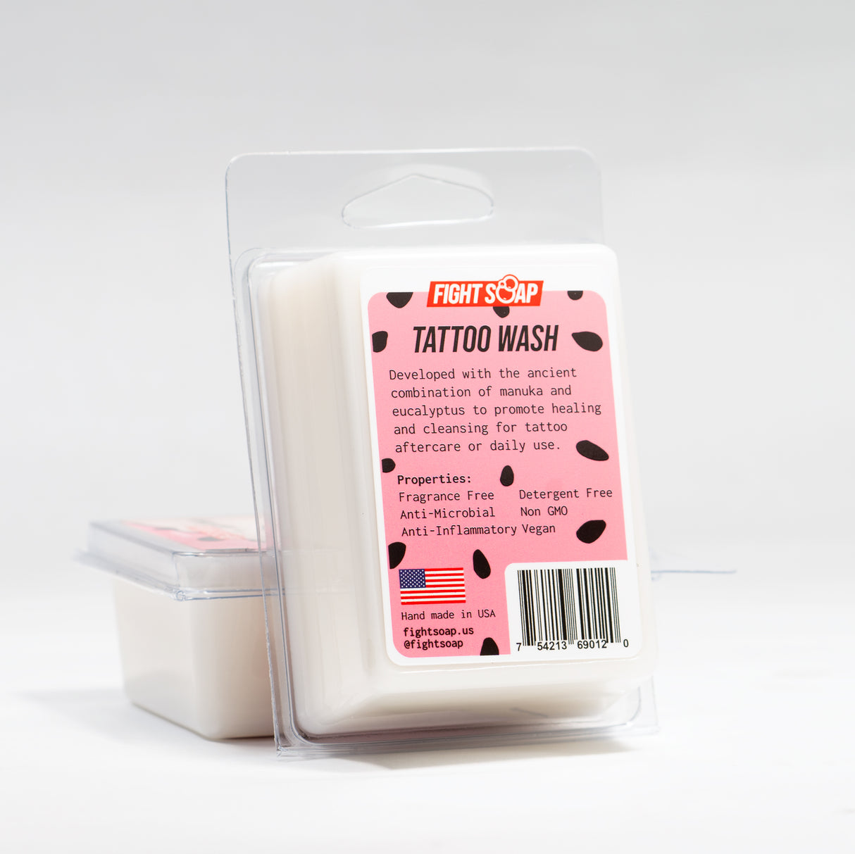 A white container of Knarly Gav Tattoo Wash with a pink label, black spots, and product details for tattoo aftercare.