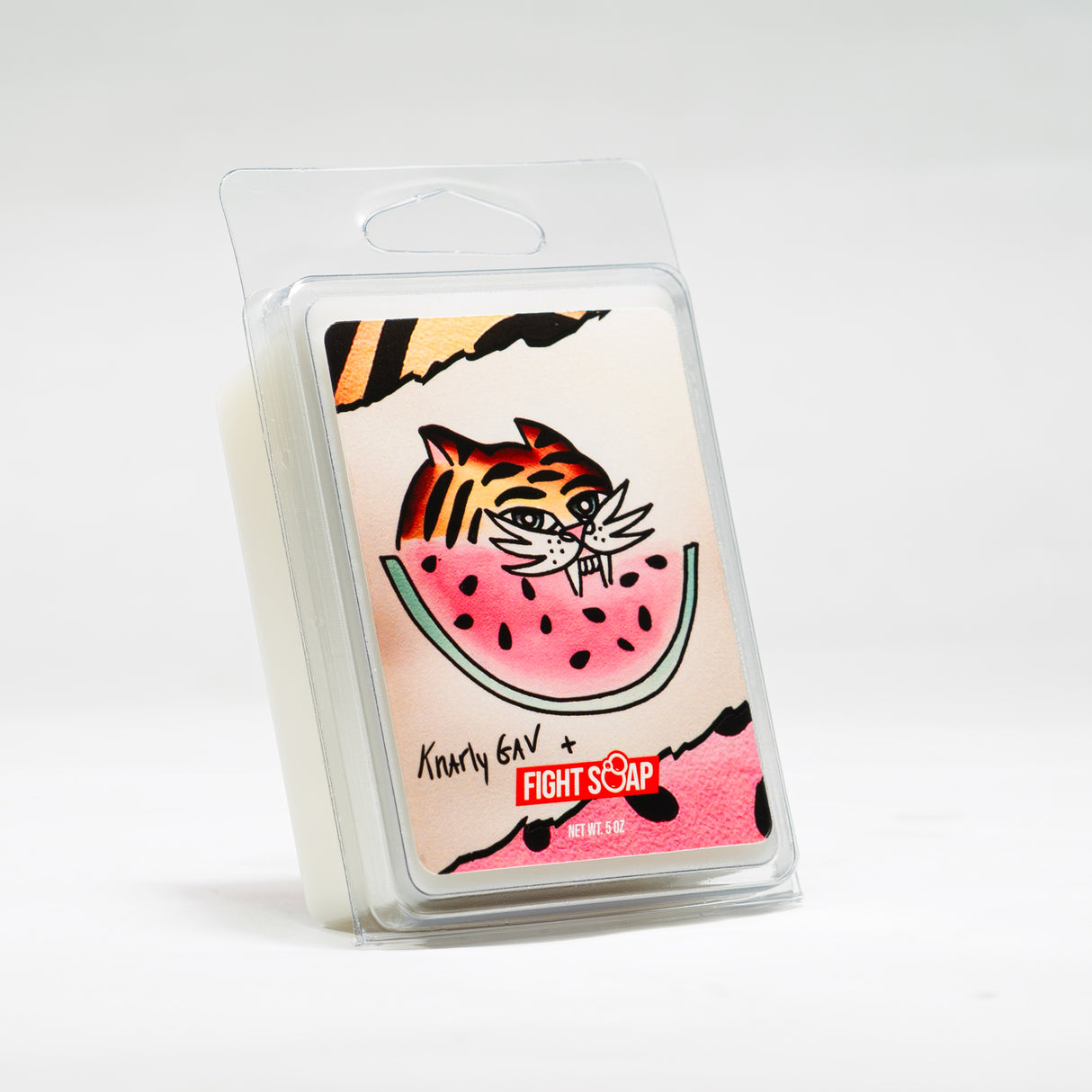 A clear plastic case of Knarly Gav Tattoo Wash featuring a colorful watermelon and tiger illustration with "Fight Soap" branding.