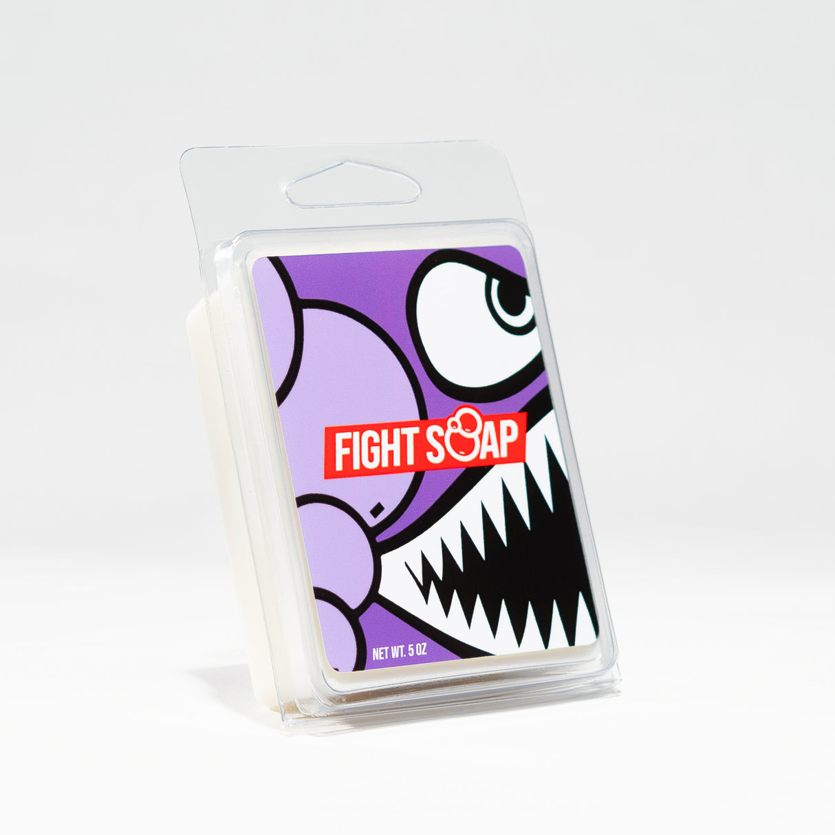 A purple cartoon character with sharp teeth and a large eye, labeled "Fight Soap," in a clear plastic case.