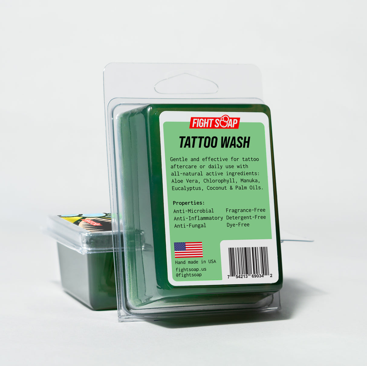 Tattoo Wash 2.0 in green packaging with label highlighting natural ingredients and antimicrobial, anti-inflammatory, and dye-free properties.