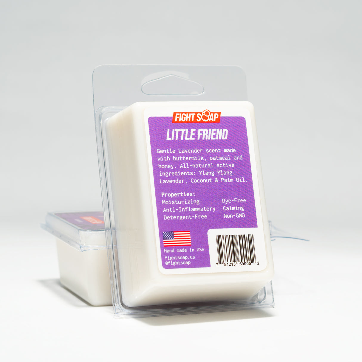 Bar of lavender-scented soap labeled "Little Friend" in purple packaging, made with natural ingredients like ylang ylang, coconut, and palm oil.