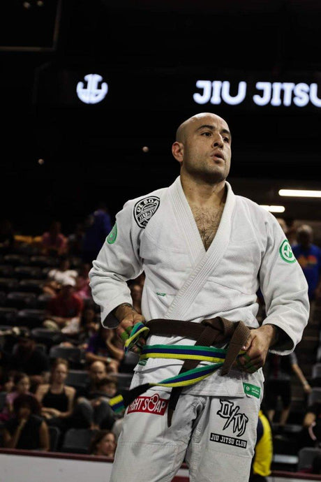 man in a fight soap bjj gi at a competition